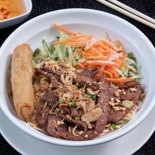 V5. Grilled Marinated Chicken & Crispy Spring Roll over Vermicelli
